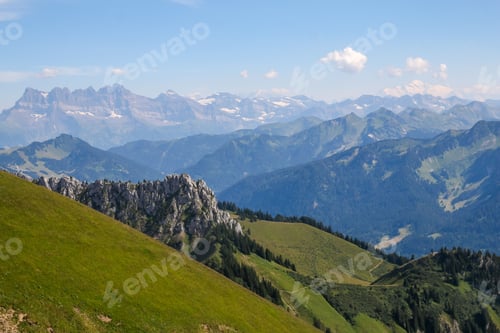 Preview: Aerial view of mountain landscape with dense trees