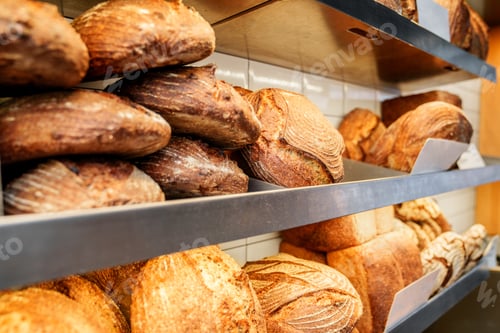 Preview: Assorted Artisan Breads on Bakery Shelves - Fresh and Crusty