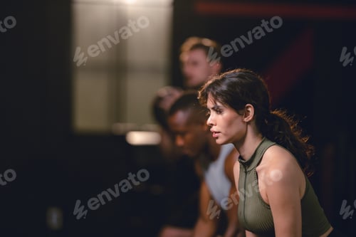 Preview: Personal trainer coach helping young woman exercising in the sport gym, exercise training workout