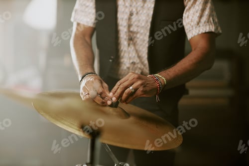Preview: Drummer Adjusting Cymbal On Stage Before Show