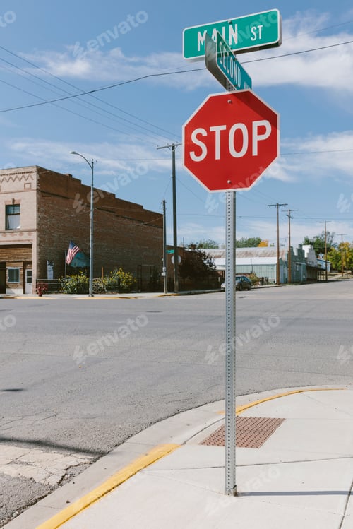 Preview: Stop sign at an intersection in a small town.