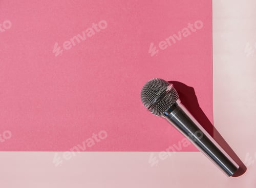 Preview: The microphone is on a bright pink background. The view from the top.
