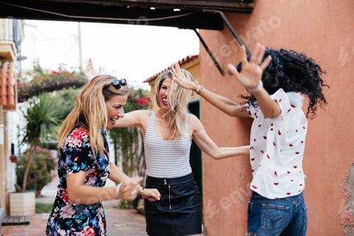 Preview: Three girls having fun on the street