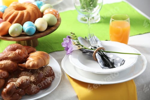 Preview: Festive Easter table setting with traditional meal