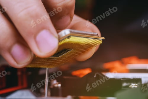 Preview: Engineer Technician plug in computer CPU microprocessor to motherboard socket