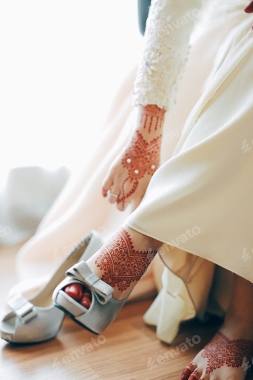 Woman's Wedding Day with Ornamental Mehndi and Shoes