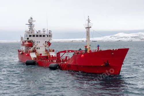 Preview: red trawler at sea