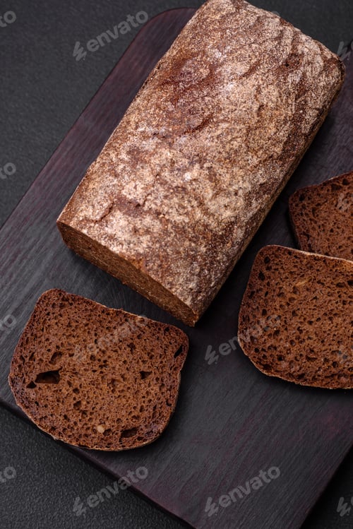 Preview: Loaf of fresh crispy brown bread with grains and seeds