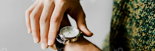 Preview: Closeup of a black watch on a wrist