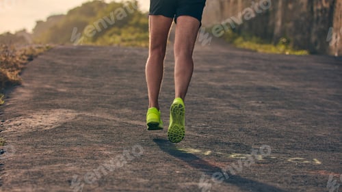 Preview: Man Jogging On A Downhill / Uphill In Suburb Mountain Road.