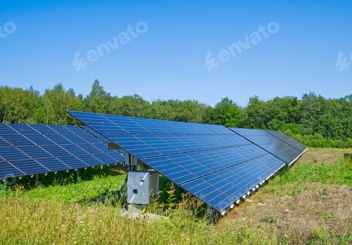 Preview: Solar power plant in summer day. Photovoltaic panels for renewable electric production.