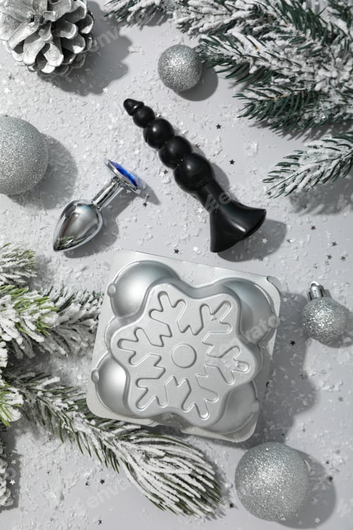 Preview: Sex toys with Christmas gifts on the background.