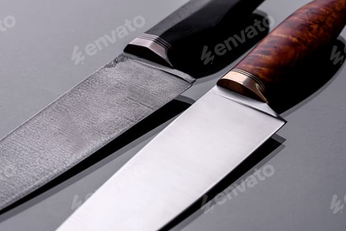 Preview: A large handmade hunting knife lying on a dark background