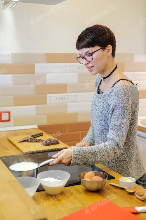 Preview: Portrait Of Woman Cooking Dessert.