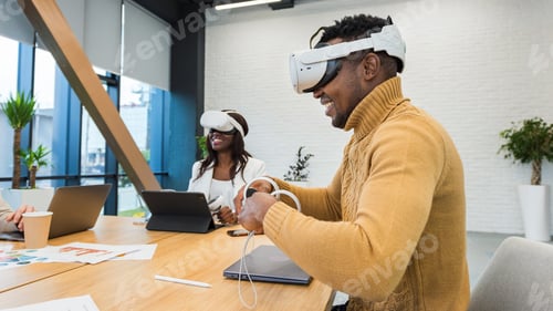 Preview: Business conference in VR in an office. A black man and woman using VR glasses