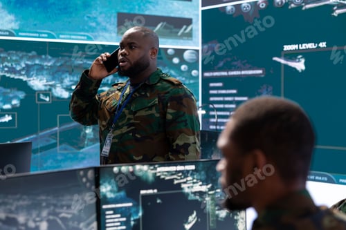 Preview: Military officers work in a high tech army control tower base