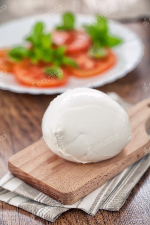 Preview: Buffalo Mozzarella, Italian cheese on wooden board.