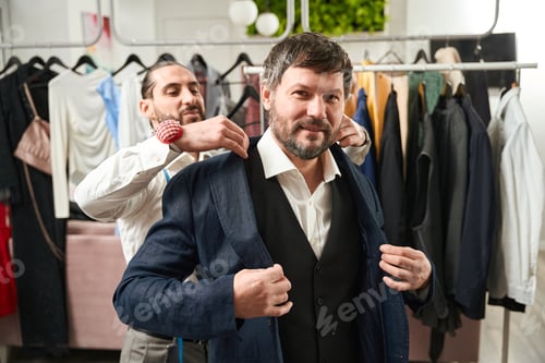 Preview: Man Being Fitted for Suit by Tailor