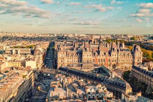 Preview: View of Parisian streets with historic buildings and the city hall under a clear sky, Paris, France