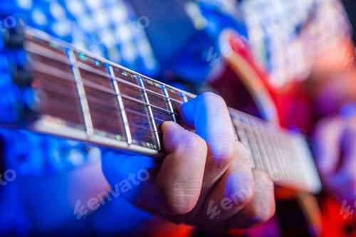 Preview: Close-up of the hands of a musician playing an acoustic guitar