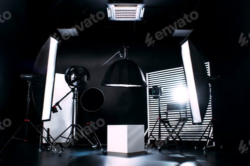 Preview: Modern photo studio with professional equipment. Black cyclorama.