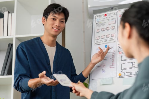 Preview: A designer presenting a concept to colleagues while fostering creative discussions.