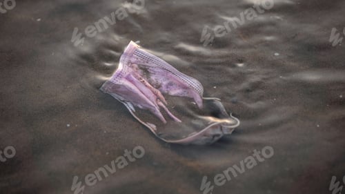 Preview: Waste during COVID19. Discarded ocean coronavirus face masks. Pollution
