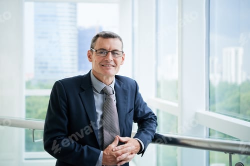 Preview: Successful Mature Company Executive At Office