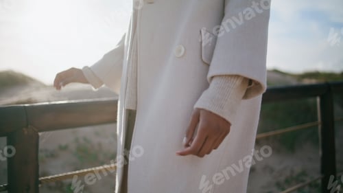 Preview: Woman body walking pier in sunlight closeup. Peaceful female enjoying beach