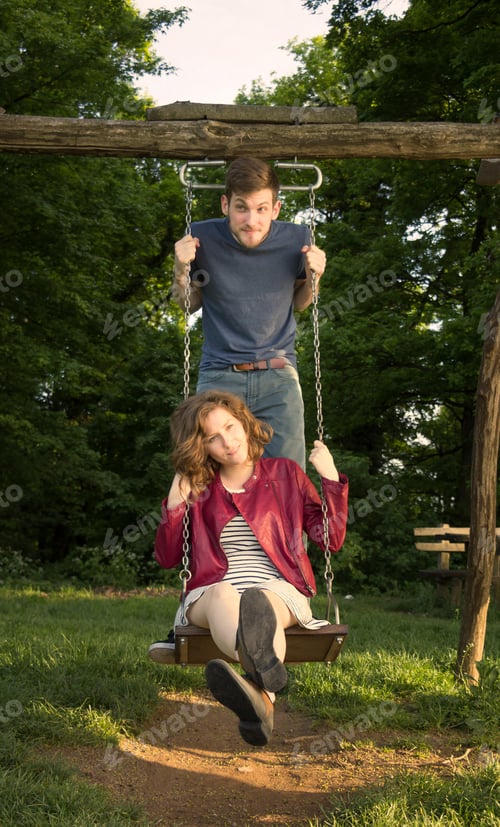 Preview: Cute Girl And Boy, On A Swing, Funny Face Expressions.