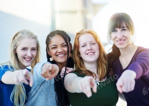 Preview: It all starts with you. Portrait of a group of women pointing their fingers forward together.