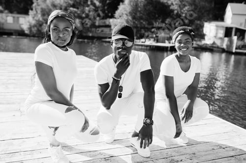 Preview: Stylish african american friends in white