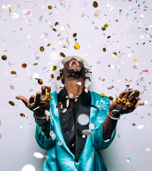 Preview: portrait of an hip hop music performer with confetti drop