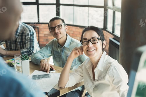 Preview: Audience listening to speaker at business meeting