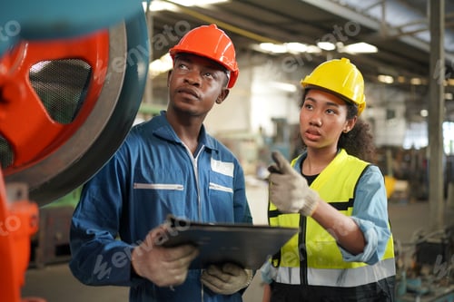 Preview: Factory Engineer Operating machines in industry factory.