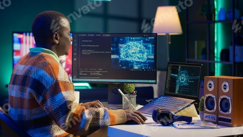 Preview: African american IT professional managing AI system for machine learning