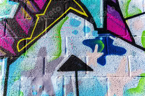 Visualização: Fundo com textura de parede pintada setas coloridas e graffiti.