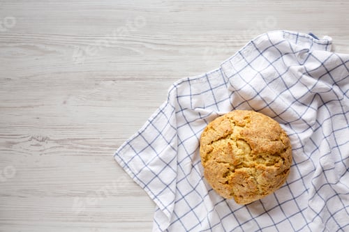 Preview: Homemade Irish Soda Bread on a white wooden background, top view. Flat lay, overhead, from above