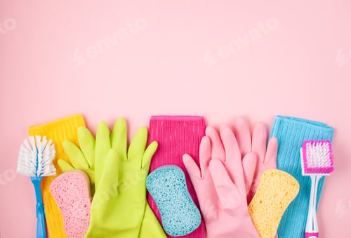 Preview: Detergents and cleaning accessories in pastel color. Cleaning service, small business idea. Top view