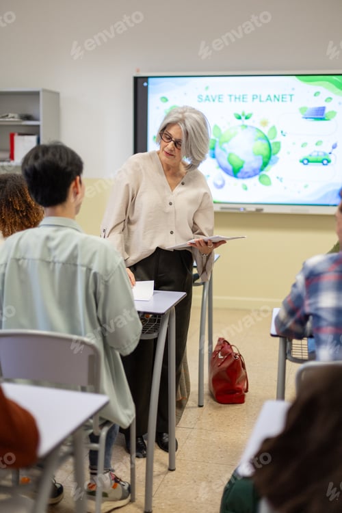 Preview: Senior teacher engaging student in environmental lesson