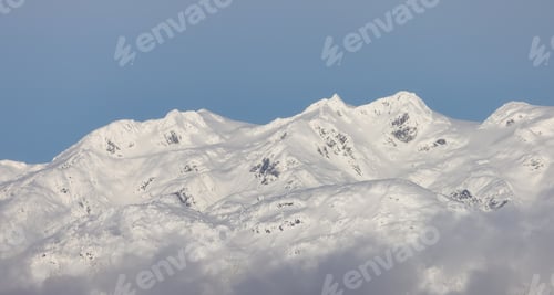 Preview: Snow and Cloud covered Canadian Nature Landscape Background. Whistler
