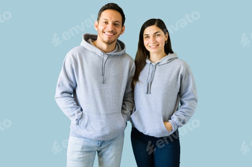 Preview: Young woman and man with trendy hoodies