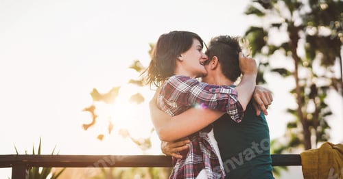 Preview: Happy lesbian couple embracing outdoor - Young gay women having a tender romantic moment