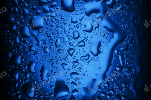 Preview: close up. drops of water on a glass of water