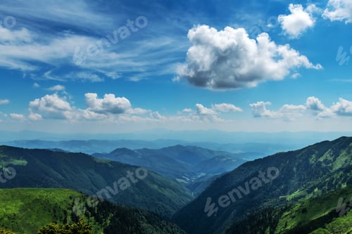 Preview: Beauty blue foggy mountains range