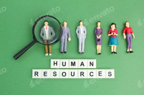 Preview: magnifying glass and miniature people with the word Human resource.