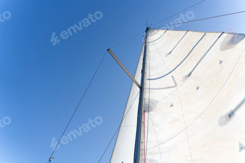 Preview: Sailboat mast reaching for the clear blue sky