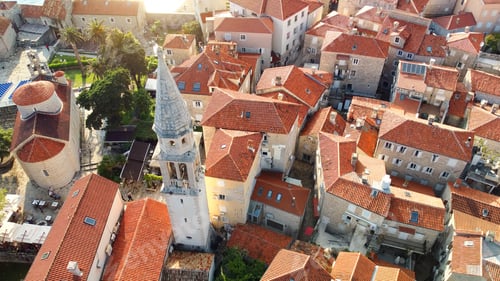 Preview: Panoramic sunset aerial drone view of ancient city of Budva, Montenegro.