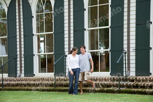 Preview: Couple outdoors by building