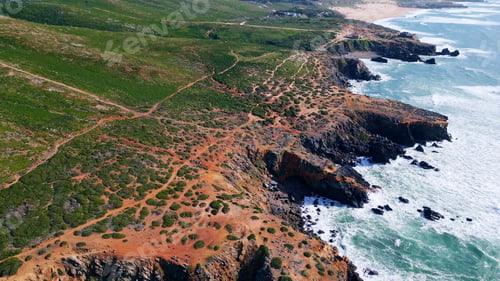 Preview: Aerial beautiful littoral landscape with stormy sea crashing of rocky shoreline.
